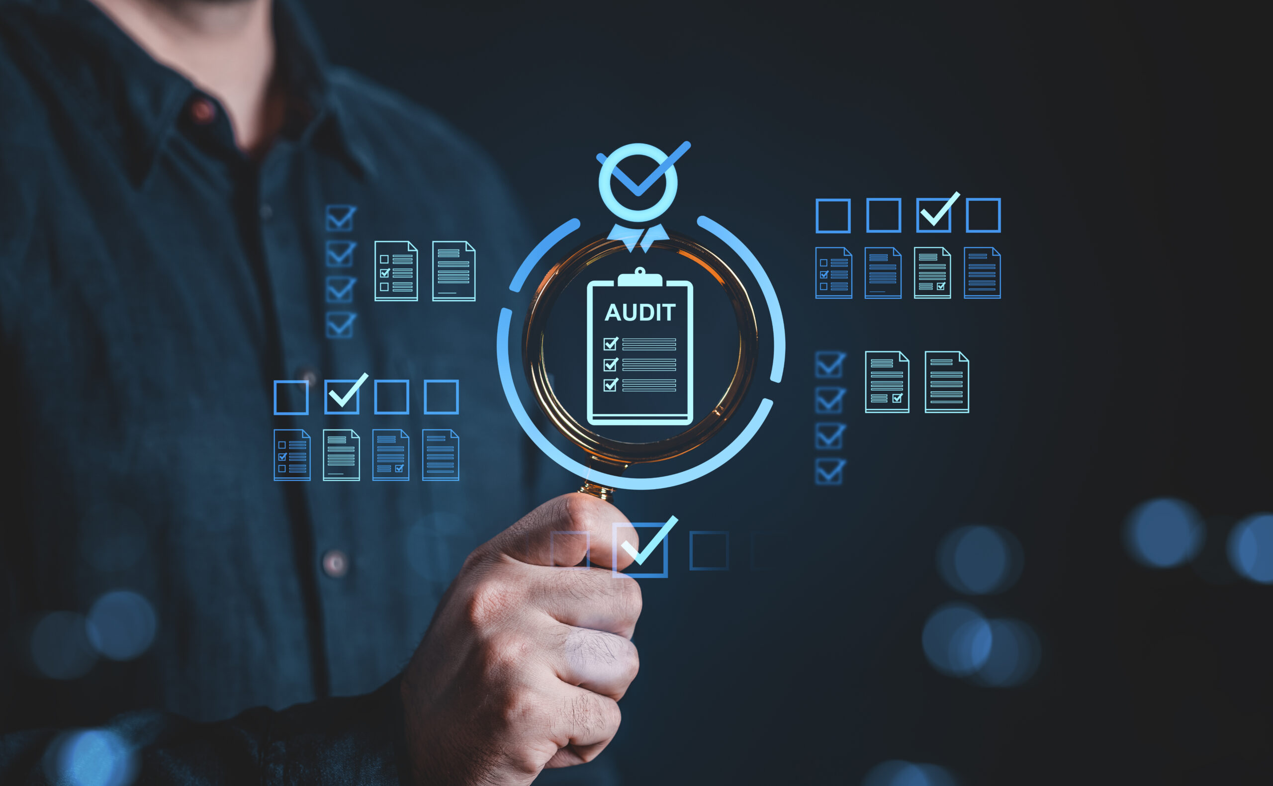 Businessman focusing on audit checklist through magnifying glass icon interface.